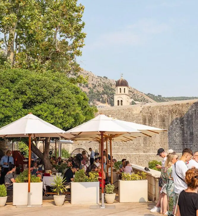Outdoor dining near historic architecture